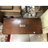 A VINTAGE BRASS BOUND COFFEE TABLE