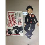 THE AMAZING DANCING CHARLIE ILLUSION, A PRINTED CARDBOARD FIGURE OF CHARLIE CHAPLIN WITH ORIGINAL