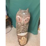 A LARGE POLYNESIAN CARVED WOODEN OWL WITH A CARVED WOODEN TORTOISE