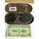 A PAIR OF MILITARY GOGGLES IN ORIGINAL OVAL METAL TIN