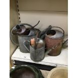 THREE LARGE GALVANISED WATERING CANS IN VARYING CONDITIONS