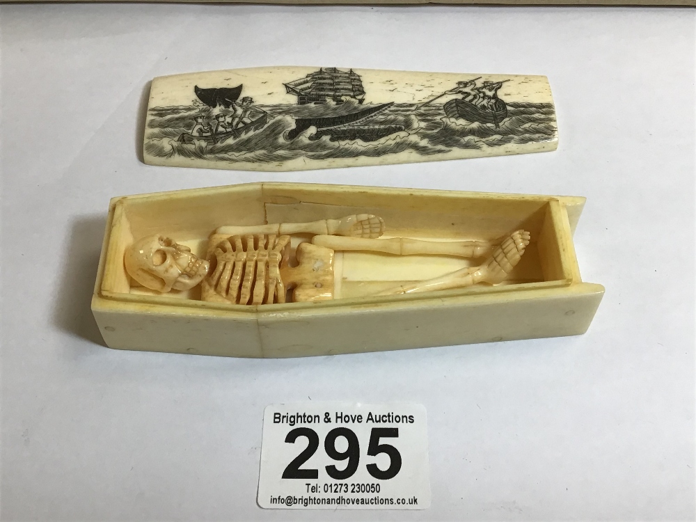 A COPY OF A CARVED BONE SCRIMSHAW COFFIN CASKET WITH WHALING SCENE ADORNING THE LID, OF WHICH - Image 2 of 5
