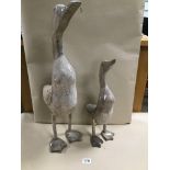 TWO CARVED WOODEN FIGURES OF STANDING DUCKS, LARGEST 66CM HIGH (AF)