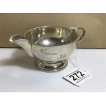 A SILVER MILK JUG OF CIRCULAR FORM WITH BEEDED RIMS, HALLMARKED BIRMINGHAM 1931 BY A L DAVENPORT