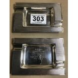 A PAIR OF ART DECO STYLE SILVER ASH TRAYS OF RECTANGULAR FORM WITH ENGINE TURNED DECORATION,