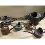 SIX EARLY COPPER WATERING CANS OF VARYING SIZES