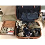 A MID CENTURY CARRY CASE CONTAINING A VARIETY OF MILITARY FIELD GEAR, INCLUDING FIRST AID RELATED