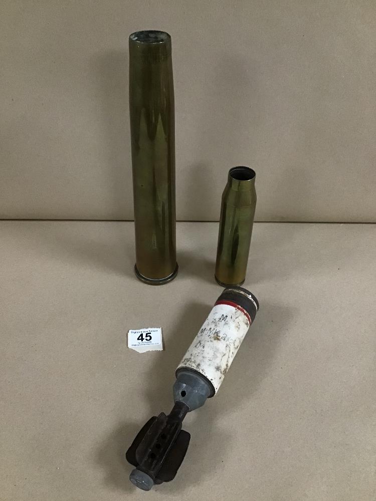 A MID CENTURY MORTAR GRENADE SHELL CASE, 24CM LONG, TOGETHER WITH TWO BRASS SHELL CASES