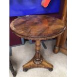 A REGENCY WINE TABLE ON A FLUTED BASE