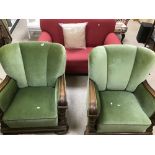 A VINTAGE PAIR OF CONTINENTAL ARMCHAIRS IN GREEN CRUSHED VELVET