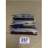 AN ASSORTMENT OF BALLPOINT PENS AND PENCILS INCLUDING FOUR PARKED PENS