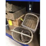 A COLLECTION OF WICKER BASKETS, TRAYS AND HAMPERS
