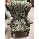 A PARKER KNOLL PK 720 WING BACK ARMCHAIR