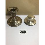 AN EDWARDIAN SILVER CIRCULAR SQUAT CANDLESTICK, HALLMARKED BIRMINGHAM 1909, TOGETHER WITH A SILVER