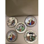 A GROUP OF FIVE EARLY 20TH CENTURY ROYAL DOULTON WALL PLATES, COMPRISING THREE VERSIONS OF 'THE