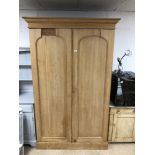 A VINTAGE PINE WARDROBE