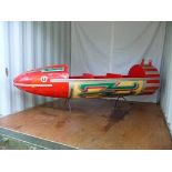 A RED VINTAGE FIBREGLASS AND WOOD FAIRGROUND ROCKET RIDE 1950'S 252CMS