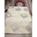 A MODERN CREAM RUG 230 X 164CMS