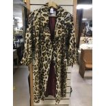 A VINTAGE JAEGER SIZE 12 LONG FUR STYLE COAT