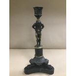 A LATE 19TH/EARLY 20TH CENTURY CONTINENTAL BRONZE FIGURAL CANDLESTICK, RAISED UPON TRIPOD BASE, 28.