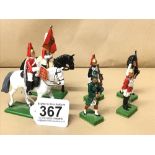 SIX BRITAIN'S PAINTED METAL SOLDIERS, COMPRISING TWO CAVALRYMEN AND FOUR FOOT SOLDIERS, SOME DATED