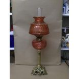 A LARGE VICTORIAN BRASS OIL WITH CRANBERRY GLASS BOWL AND SHADE, 67CM HIGH