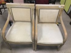 A PAIR OF MODERN CHAIRS WITH CREAM FABRIC