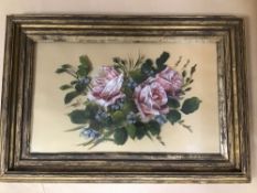 A LATE 19TH/EARLY 20TH CENTURY PAINTED GLASS PANEL OF ROSES, MOUNTED IN WORN GILT FRAME, 58CM