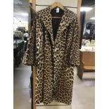 A VINTAGE LEOPARD STYLE LONG FUR COAT