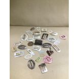 AN ASSORTMENT OF MOTHER OF PEARL BELT AND SHOE BUCKLES