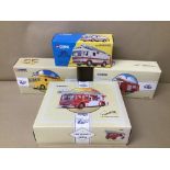 FOUR BOXED CORGI CLASSICS FIRE VEHICLES, INCLUDING THE CARDIFF AEC LADDER FIRE VEHICLE, AEC PUMP