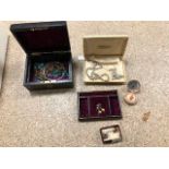 A SMALL ASSORTMENT OF COSTUME JEWELLERY, SOME OF WHICH IN A LEATHER BOUND TRAVELLING JEWELLERY BOX