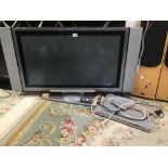 A HITACHI 37 INCH TV MODEL 37PD5200-E WITH A PHILLIPS DVD PLAYER