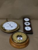 A BAROSTAR NAUTICAL STYLE WALL BAROMETER AND TWO OTHERS