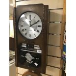 A MID CENTURY PRESIDENT 30 DAY, DAY DATE WALL CLOCK, 53CM HIGH