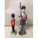 A COMMEMORATIVE CERAMIC FIGURE OF A SCOTTISH SOLDIER BY T.GOODE & CO FOR THE CENTENARY OF WATERLOO,