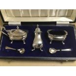 A MID CENTURY SILVER THREE PIECE CONDIMENT SET WITH ORIGINAL SPOONS, IN ORIGINAL FITTED BOX,