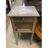 A FRENCH OAK BEDSIDE CHEST WITH PINK MARBLE TOP