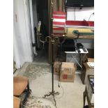 A GILDED BRASS STANDARD LAMP
