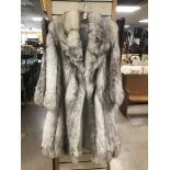 A VINTAGE LONG FOX FUR COAT