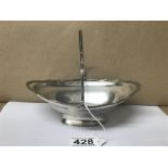 AN EARLY 20TH CENTURY OVAL SILVER BON BON DISH RAISED UPON PEDESTAL BASE WITH SINGLE SWING HANDLE,