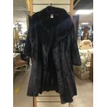 A VINTAGE LONG MUSQUASH FUR COAT WITH STOLE