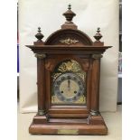 A VICTORIAN OAK BRACKET CLOCK BY ERHARD JUNGHANS, C.1861-70, THE BRASS DIAL WITH ARABIC NUMERALS