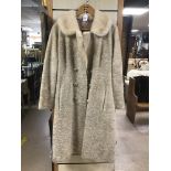 A VINTAGE LAMBSWOOL ASTRAKAN LONG FUR COAT