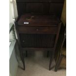 A TAMBOUR FRONTED BEDSIDE CHEST WITH DRAWER
