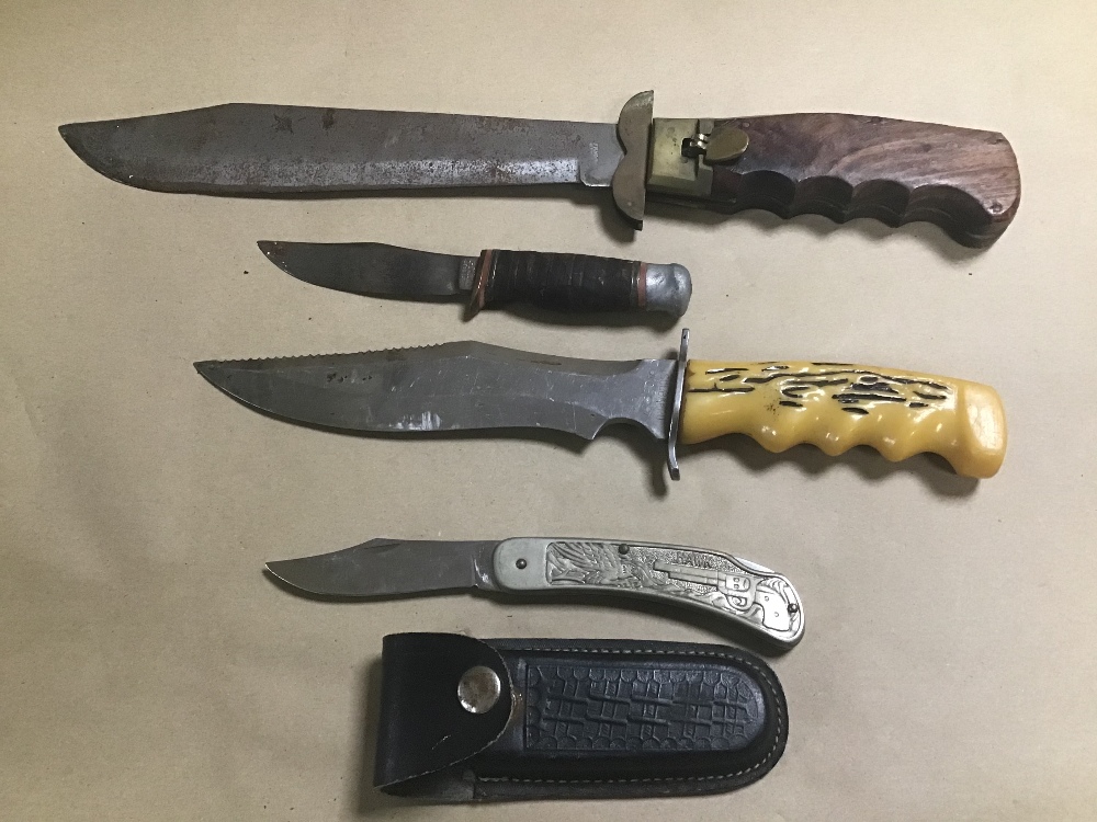 FOUR ASSORTED KNIFES, INCLUDING A SCUBAPRO AO3837, LARGE FOLDING KNIFE ETC