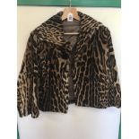 A VINTAGE LEOPARD STYLE FUR JACKET SIZE 12