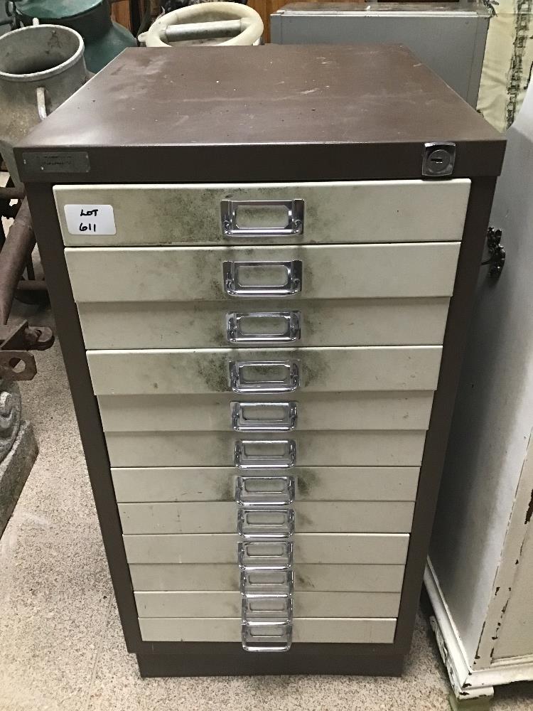 A TWELVE DRAWER FILING CABINET IN METAL WITH CONTENTS FROM A WATCH AND CLOCK REPAIRER