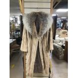 A VINTAGE LONG FUR COAT