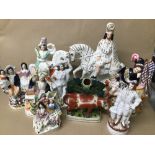 A COLLECTION OF STAFFORDSHIRE FIGURES, LARGEST 37.5CM HIGH